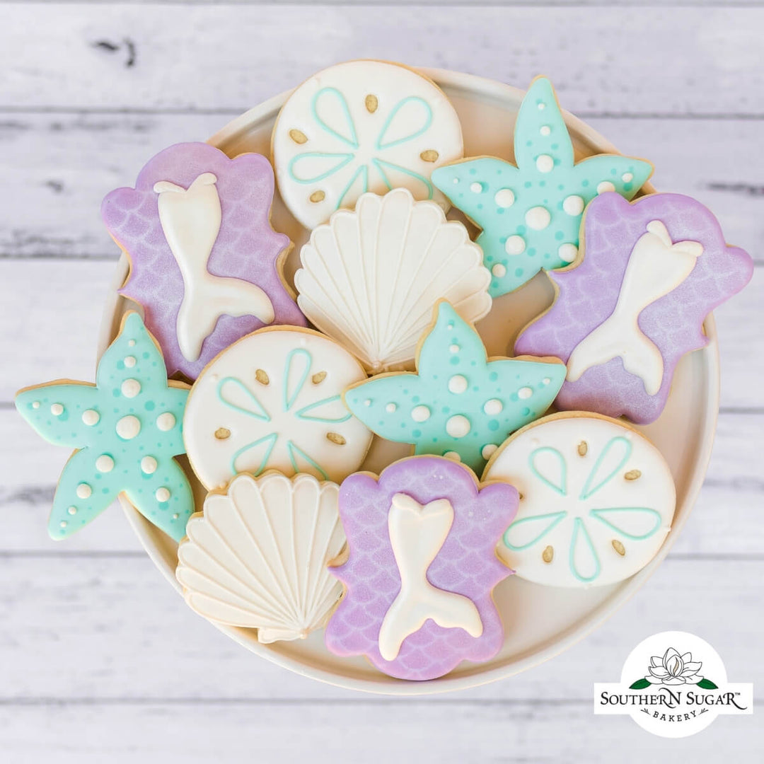 Dive into Fun: Delightful Mermaid-Themed Decorated Cookies for an Enchanted Ocean-Inspired Birthday Party!