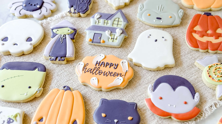 Colorful decorated Halloween skull-themed sugar cookies from Southern Sugar Bakery