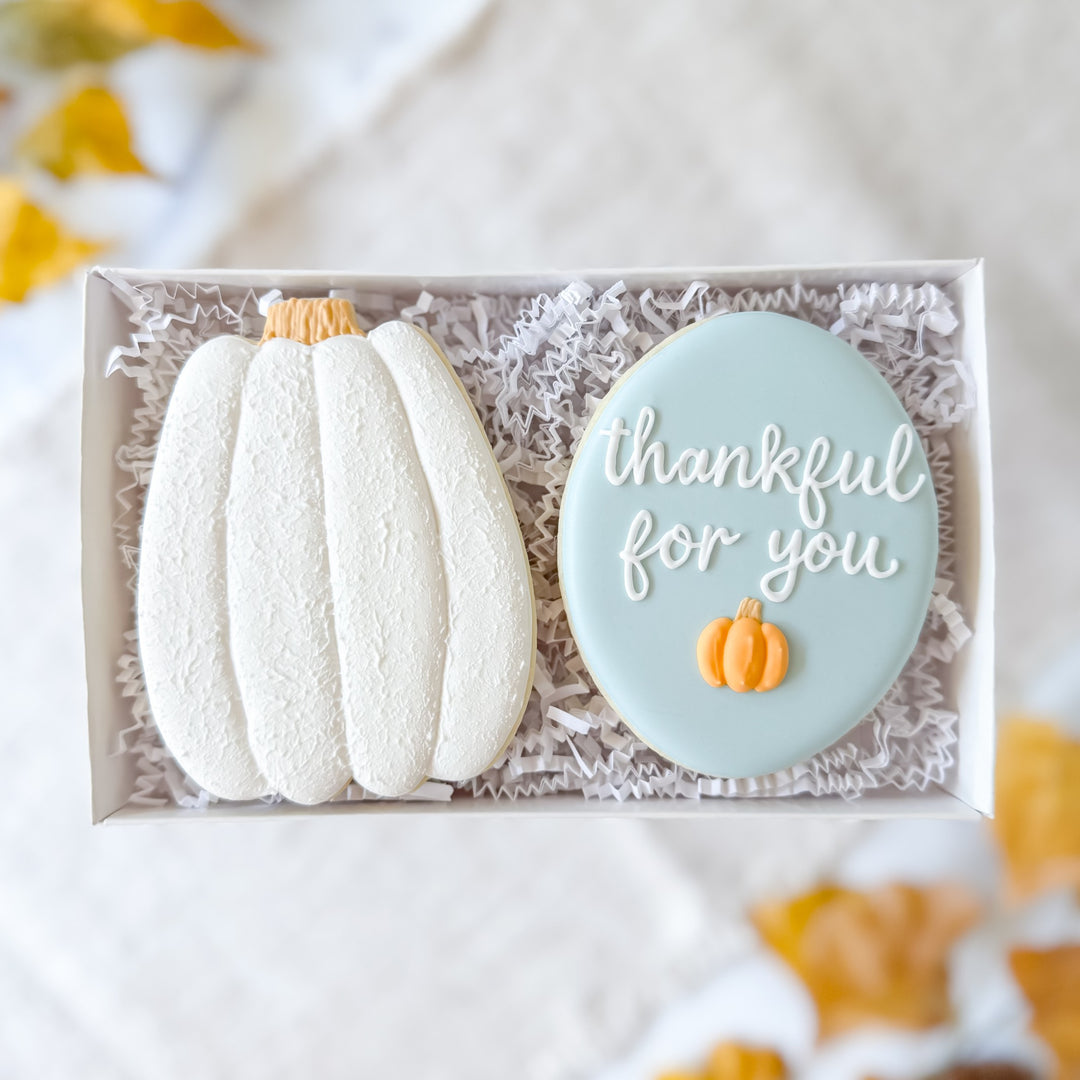 Decorated Thanksgiving cookie duo from Southern Sugar Bakery featuring festive "Thankful For You" themed cookie sets.