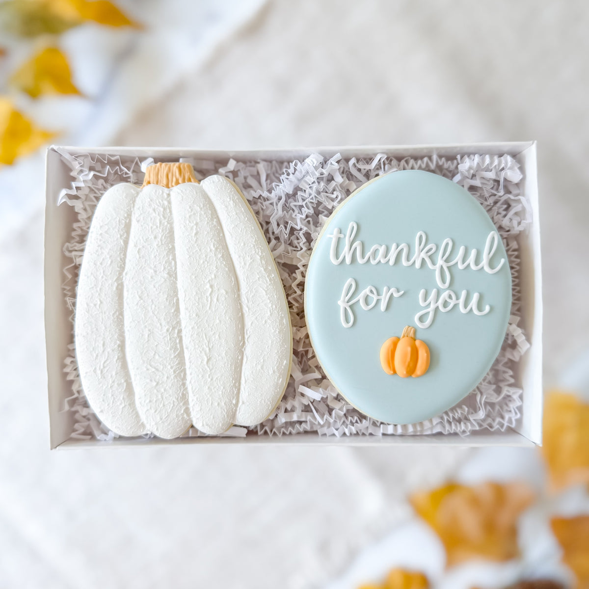 Decorated Thanksgiving cookie duo from Southern Sugar Bakery featuring festive "Thankful For You" themed cookie sets.