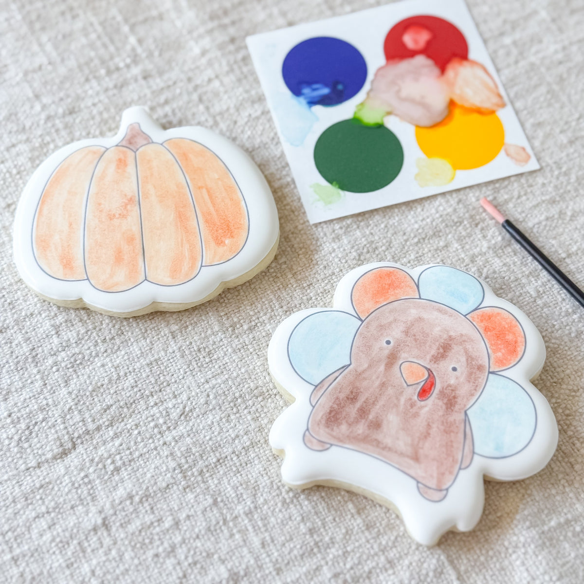 Paint-your-own Thanksgiving Duo cookies from Southern Sugar Bakery featuring fall-themed holiday cookie designs.