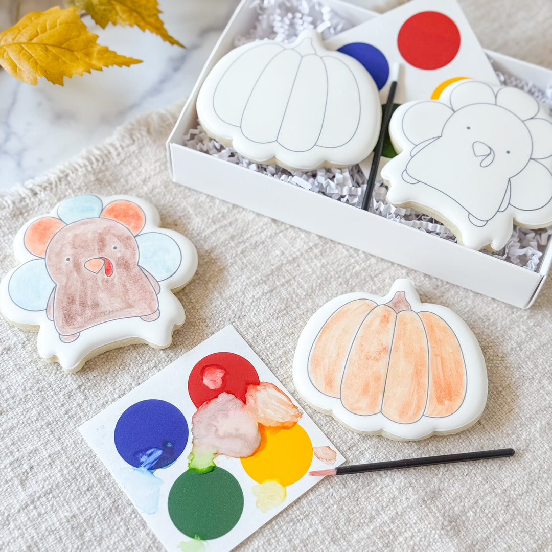 Paint-your-own Thanksgiving Duo cookies featuring fall-themed designs from Southern Sugar Bakery, perfect for holiday decorating.