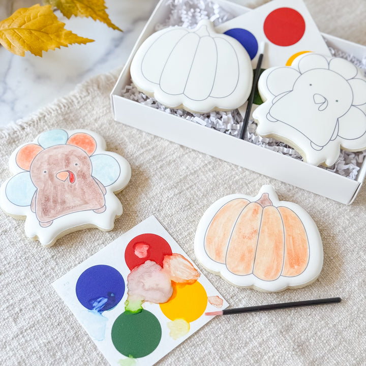 Paint-your-own Thanksgiving Duo cookies featuring fall-themed designs from Southern Sugar Bakery, perfect for holiday decorating.