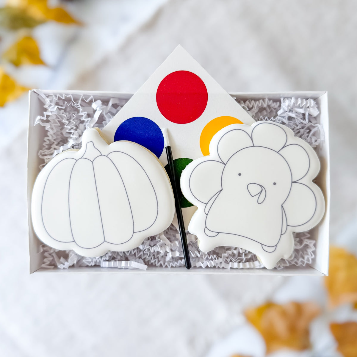 Thanksgiving Duo paint-your-own fall cookies with festive autumn designs from Southern Sugar Bakery.