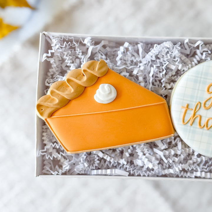 Set of decorated Thanksgiving cookies with "Give Thanks" message by Southern Sugar Bakery, featuring festive autumn designs.