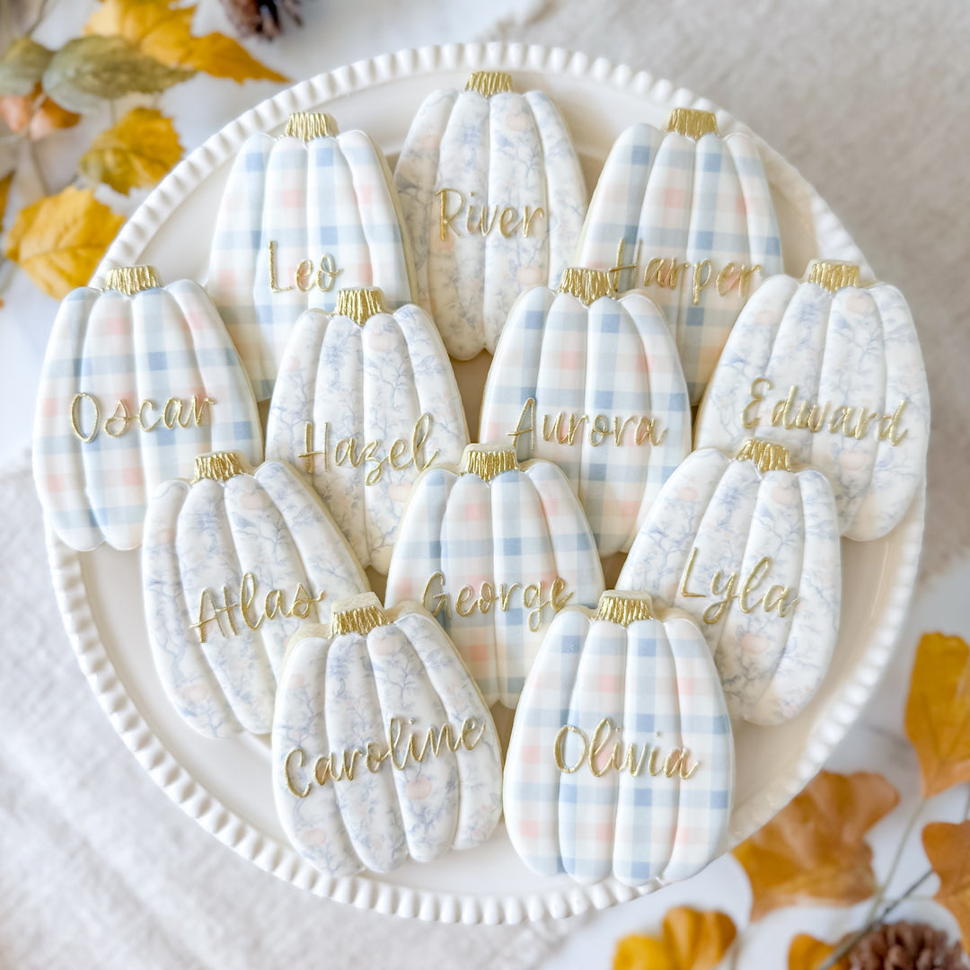 Thanksgiving pumpkin-shaped cookies with place cards from Southern Sugar Bakery&
