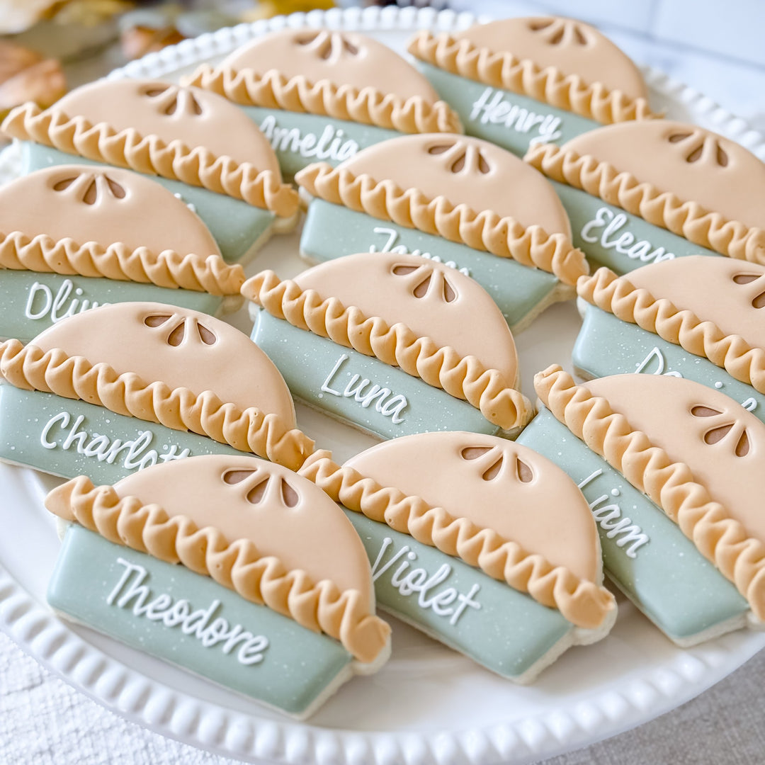 Decorated Thanksgiving cookie set with pie place cards from Southern Sugar Bakery featuring festive fall designs.