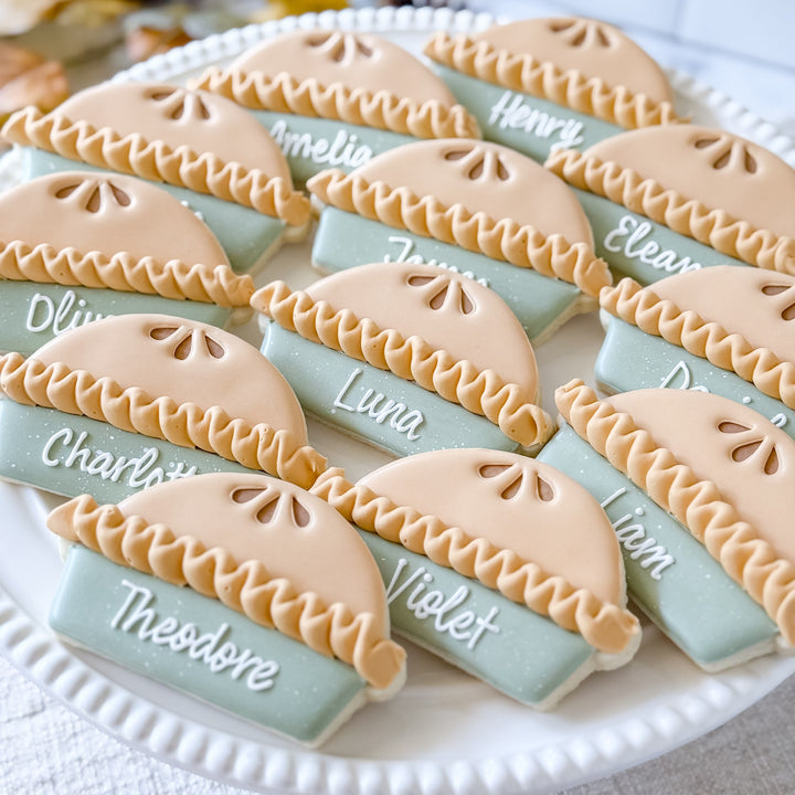 Decorated Thanksgiving cookie set with pie place cards from Southern Sugar Bakery featuring festive fall designs.